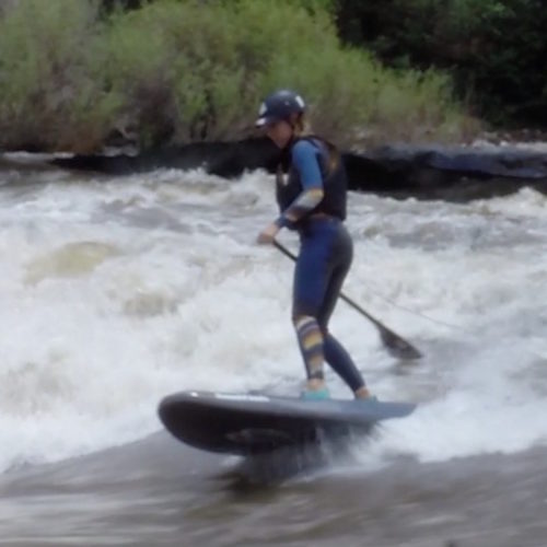 Claire Chappell SUP river surfing