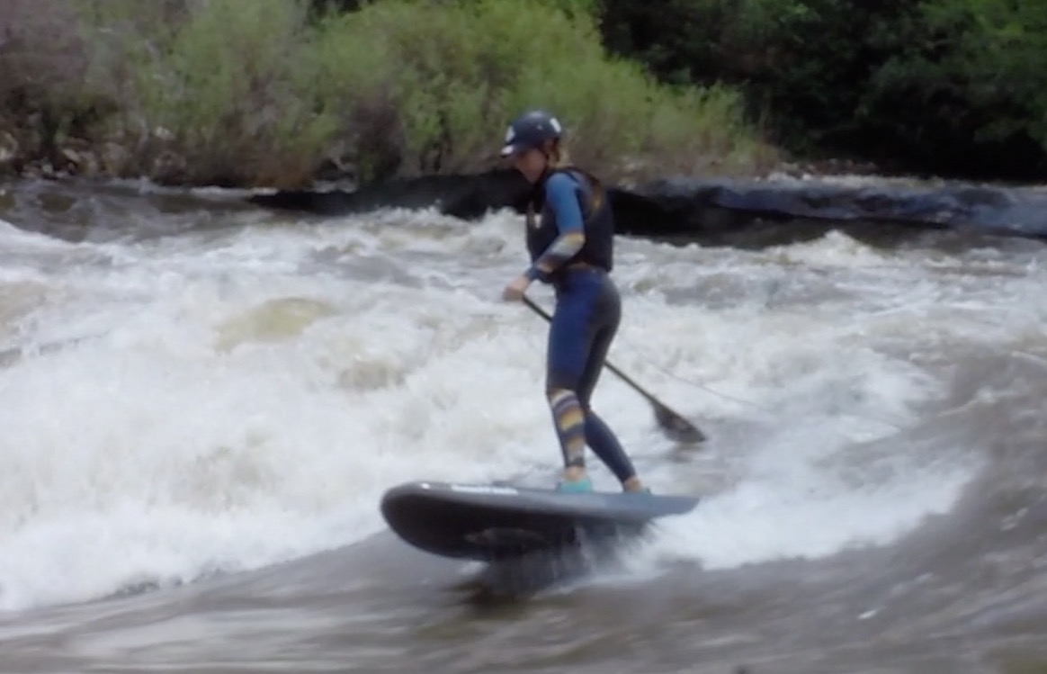 Claire Chappell SUP river surfing